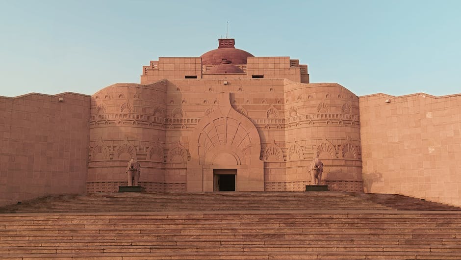 A breathtaking view of a historic architectural monument with intricate designs and statues.